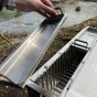 Nerezový gril na kuře s otočným rožněm UG Grill