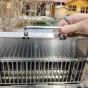 Nerezový gril na kuře a kýtu s otočným rožněm UG Grill