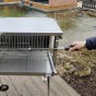 Nerezový gril na sele s otočným rožněm UG Grill